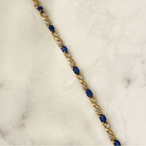 Sapphire and diamond tennis bracelet. Worn only a few times.